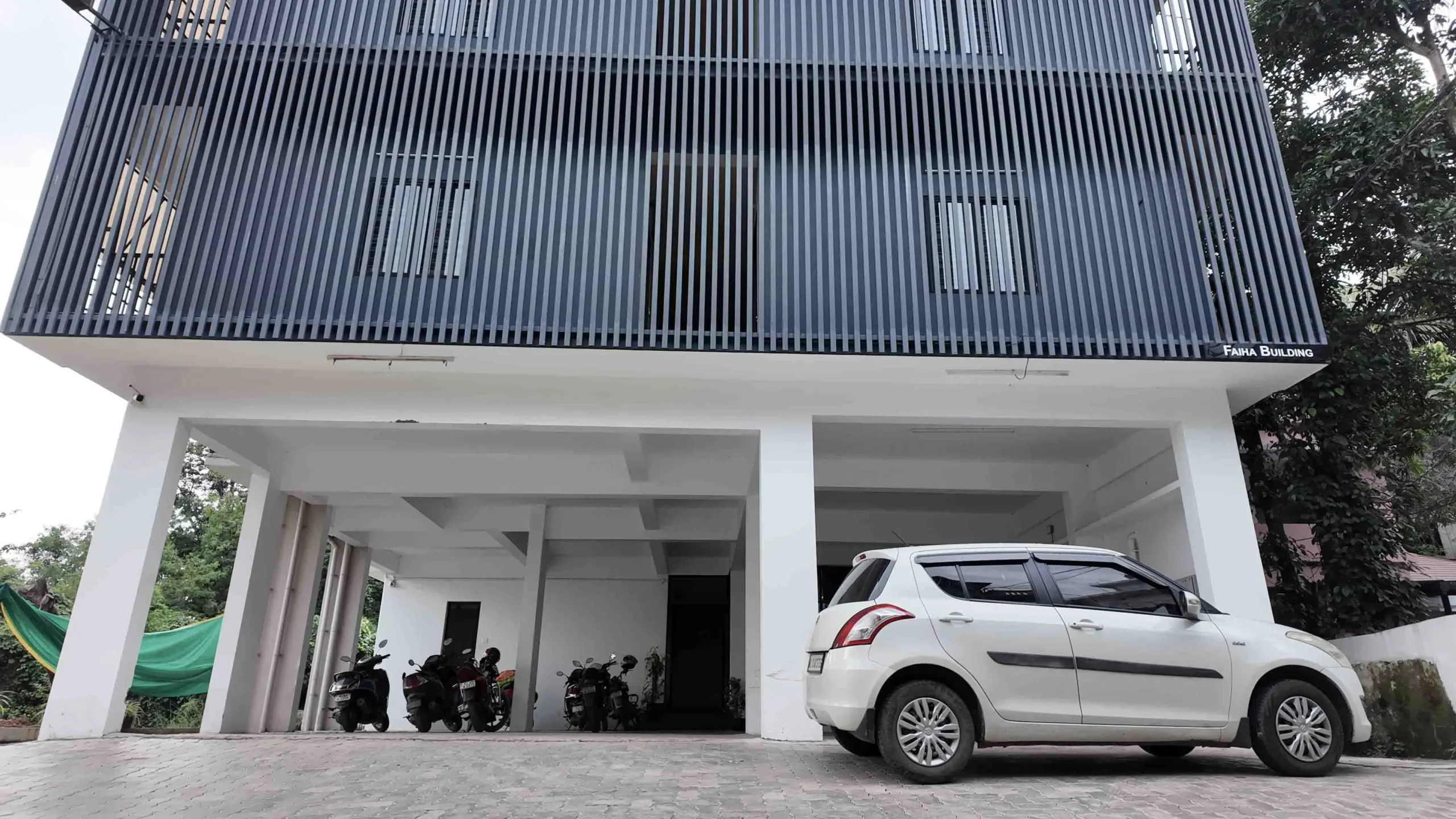 Spacious parking area at Gold Suite – best hotel rooms in Kakkanad near Infopark